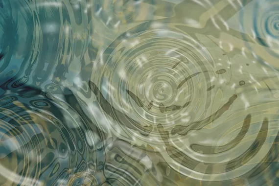 Circular ripples across water