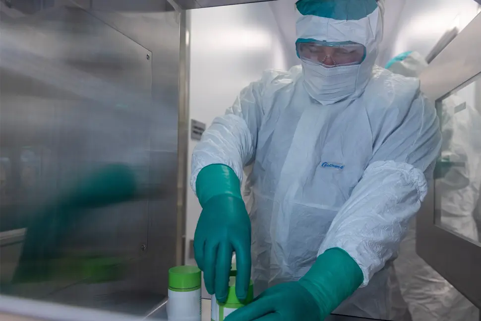Carter Jaynes, RLT Production Manager at Novartis, who delivers doses of RLT to cancer patients.