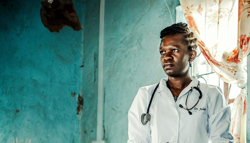 A female doctor looking in the distance